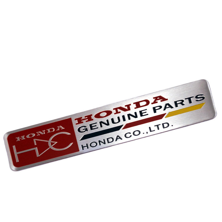 Тонкая металлическая эмблема Honda​ Genuine Parts 120*26 мм