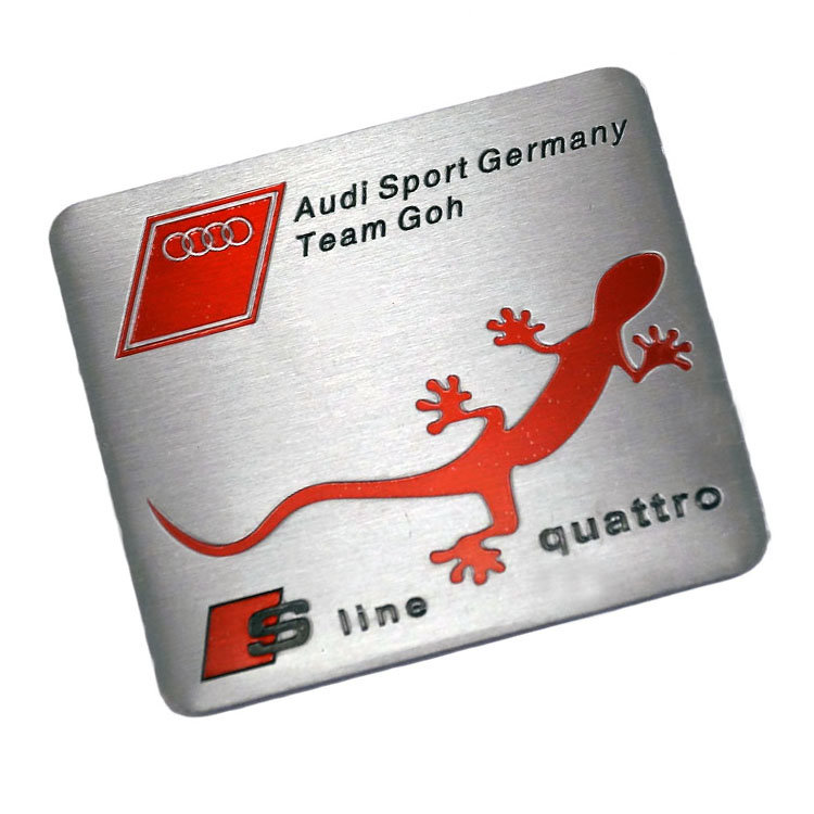 Шильдик из тонкого металла Audi quattro S-Line 60*55 мм